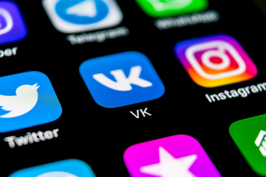 Sankt-Petersburg, Russia, September 30, 2018: Vkontakte application icon on Apple iPhone X screen close-up. VK app icon. Vkontakte mobile application. Social media network. Social media icon
