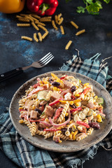 Fusilli pasta salad with smoked turkey