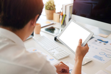 Businessman sitting in a business plan, put it through the businesses were consulted about the...