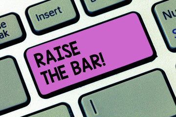 Writing note showingRaise The Bar. Business photo showcasing Set higher standards challenges...