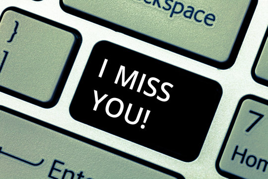 Word writing text I Miss You. Business concept for Feeling sad because you are not here anymore loving message Keyboard key Intention to create computer message pressing keypad idea