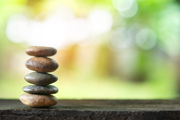 Balance stone with spa on abstract bokeh background