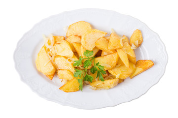 Baked potato wedges with onions and parsley.