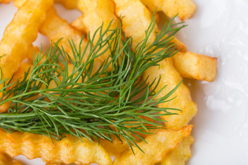 Delicious french fries with dill.