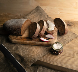 Freshly baked grain brown bread close up still life