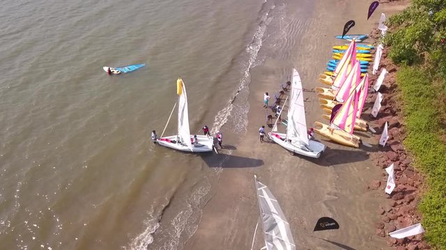 Boat sailing competition at the beach, Goa, India.