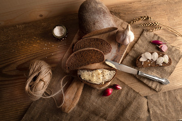Freshly baked grain brown bread close up still life