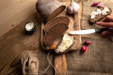 Freshly baked grain brown bread close up still life