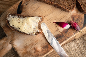 Freshly baked grain brown bread close up still life