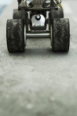 an old roller skate on concrete floor