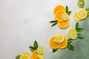 Different fresh fruits on light background