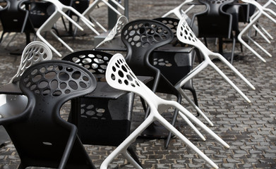 Black and white plastic chairs