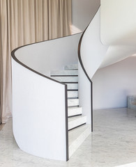 Modern interior spiral stairs in white color