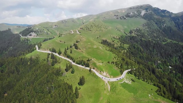 Aerial shot of a road in the mountains. Bucegi, Romania