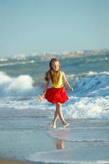 A child of the sea. Little girl is resting on the sea. 