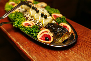 stuffed fish cut into pieces on a dish
