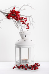 White lantern with candle