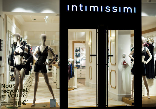 STRASBOURG, FRANCE - OCT 31, 2017: Intimissimi window shopping specializes in bras, briefs, lingerie, vests, and pyjamas for women and men at night