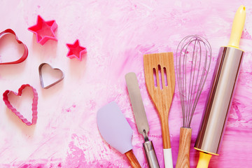 Dessert baking utensils on pink pastel background