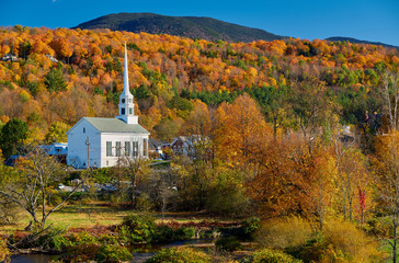 Iconic New England church in Stowe town at autumn in Vermont, USA