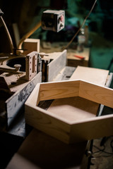 Wooden details and tools in carpentry workshop interior