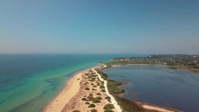 Aerial drone video of iconic lake of Korission a natural preserve and beach of Halikounas, Corfu island, Ionian, Greece