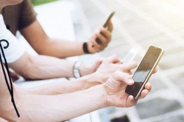 Making plans. Close up of hands holding smartphone