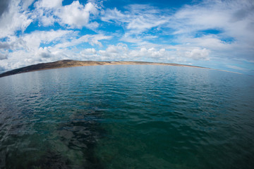 Sea and sky with clouds.