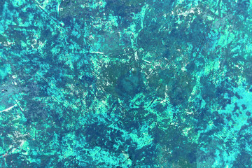 Fototapeta na wymiar Bright abstract texture of light blue paint on canvas with a color transition. Abstract texture of a blue flower on canvas.