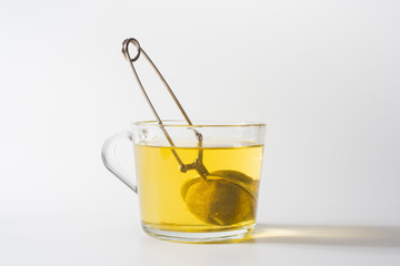 A cup of Chamomile tea in a clear glass mug