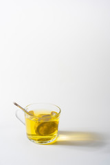 A cup of Chamomile tea in a clear glass mug