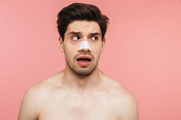 Beauty portrait of a handsome shirtless brunette man