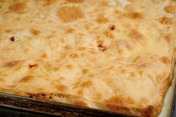 Cheese focaccia bread. Typical focaccia from Recco, Liguria, Italy
