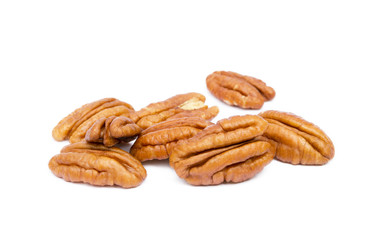 Shelled pecan nuts isolated on white background.