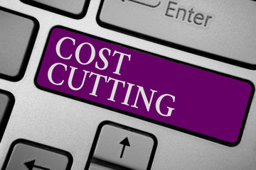Writing note showing Cost Cutting. Business photo showcasing Measures implemented to reduced expenses and improved profit Keyboard purple key Intention computer computing reflection document