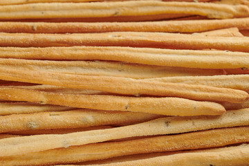 Pattern of Italian breadstick on a baking tray