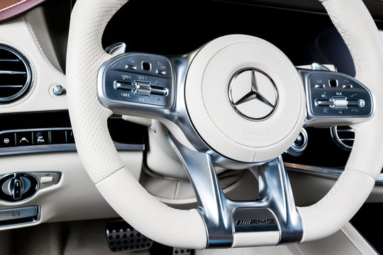 Sankt-Petersburg, Russia, January 12, 2018: Dashboard and steering wheel with media control buttons of a Mercedes Benz S 63 AMG 4Matic+ V8 Bi-Turbo 2018. Car interior detais