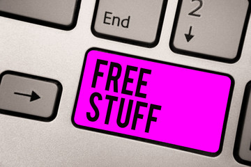 Text sign showing Free Stuff. Conceptual photo Any thing that you can have in a store that is not being paid Keyboard purple key Intention create computer computing reflection document