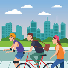 Young peple with sakteboard, skates and bikes