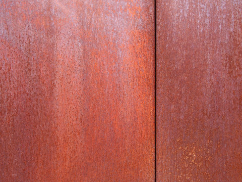 rusty steel panels with rough weathered orange brown texture