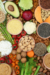 Vegan health food with sos mix, fruit, vegetables, peanut butter, almond yoghurt, nuts, seeds, grains, legumes, almond milk and yoghurt. Super foods high in antioxidants, protein and dietary fibre. 