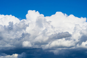 Naklejka na ściany i meble big white cloud on blue sky, background