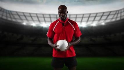 Professional rugby player standing in front of a stadium - Powered by Adobe