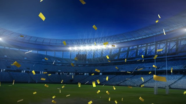 Golden confetti falling down in front of a sports stadium