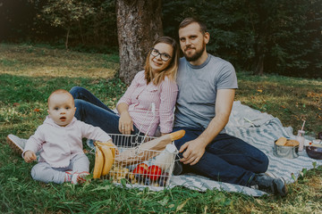 Cute happy family on picnic