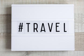 retro light box with travel hash tag