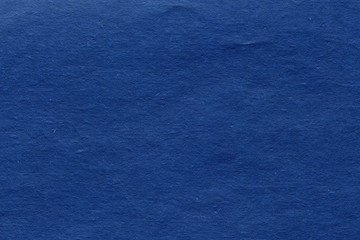 Textured blue paper background