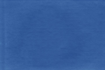 Cardboard texture close-up. Dark old paper background. Grunge concrete wall. Vintage blank wallpaper.