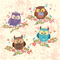vector cute owls on a branch. set