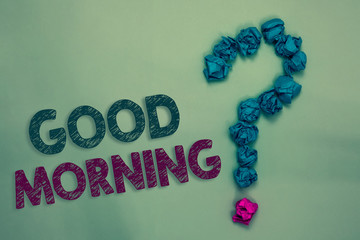 Text sign showing Good Morning. Conceptual photo A conventional expression at meeting or parting in the morning Crumpled papers forming question mark several tries unanswered doubt